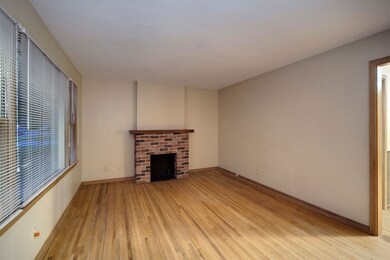 Hardwood floors, Large Picture Window, & Decorativ
