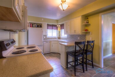 Remodeled kitchen with corner sink; all appliances