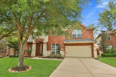 Spacious two-car garage features convenient overhe