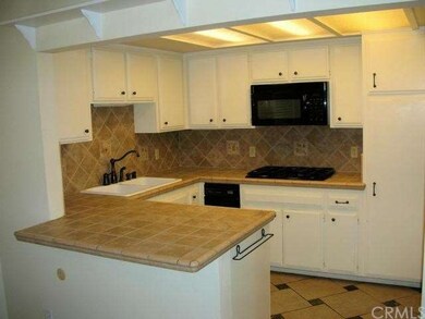Tiled kitchen with built-ins