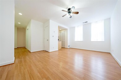 Open floor plan features large living room highlig