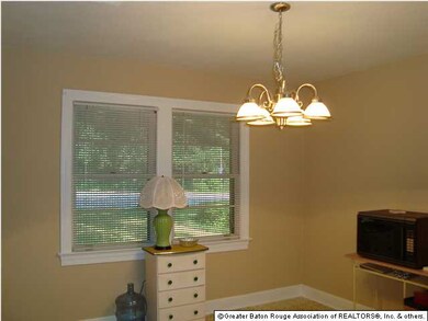 The Dining room opens a new light fixture and open