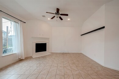 Spacious living area with views to back yard high