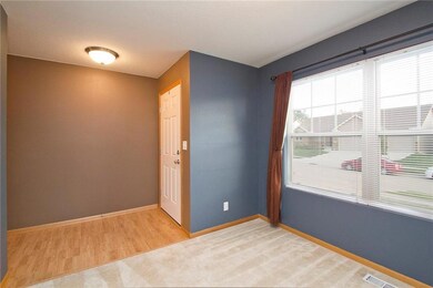 Den off front entry - large window faces front, pe