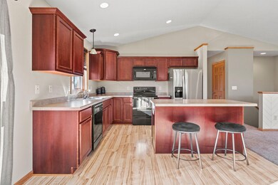 Open main level includes the kitchen, living room and informal dining area.