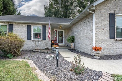 Property entrance with brick siding