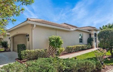 View of property exterior with a garage