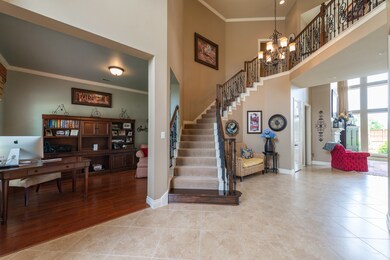 Beautiful architectural lines capture you as you enter.  The study opens to the left.
