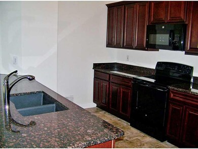 Kitchen. Granite and ceramic tile