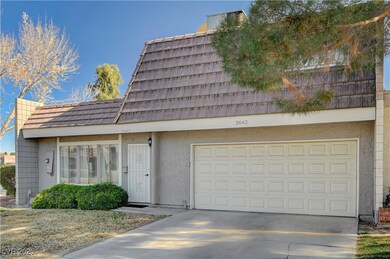 View of front of property featuring stucco siding,
