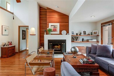 Wood burning fire place with wood detailing gives 
