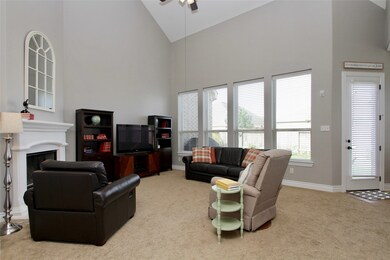 Located towards the back of the home is the Spacious, Two Story Den with back yard views.