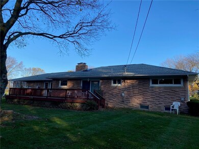 Rear of house with oversized treated deck