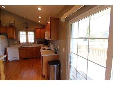 Dining area opens to deck.