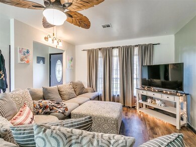 Living room with dark hardwood / wood-style floori