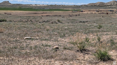 Property view of mountains featuring a rural view