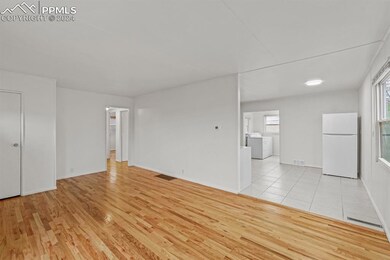 Unfurnished room featuring light hardwood / wood-s