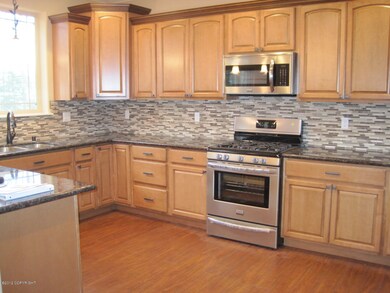 Kitchen w Tiled Backsplash