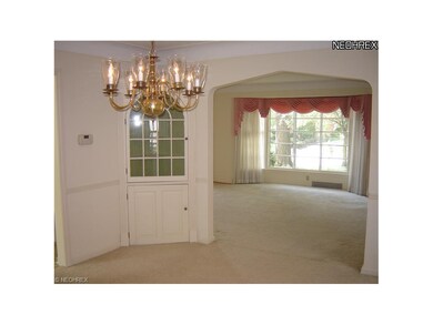 View of Living Room from Dining Room. Built-in for