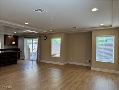 Unfurnished living room with recessed lighting and