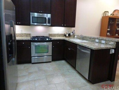 Gourmet kitchen includes stainless steel appliance
