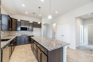 Kitchen equipped with Double ovens, Gas Range, dis