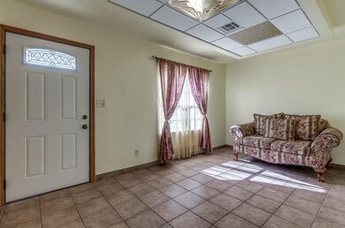 Nice size Living room with tile floors.