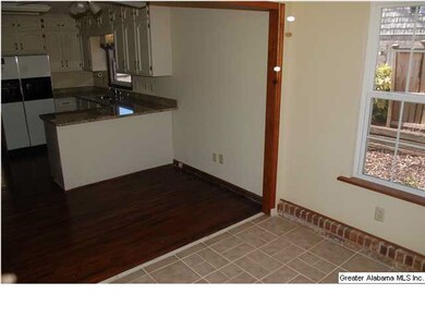 Sunroom and eat-in area - overlooks the spacious b