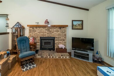 Fireplace has an insert.  This phot gives you a gl
