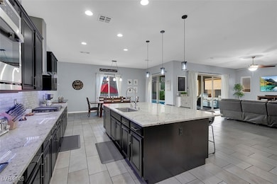 Kitchen overlooks your living room dining area and