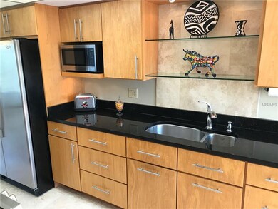 Kitchen with Galaxy Granite Countertop, custom cab