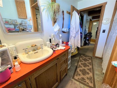 Upstairs unit's full bathroom