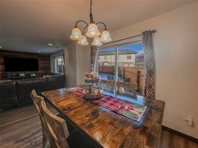 Dining area with a wealth of natural light, hardwo