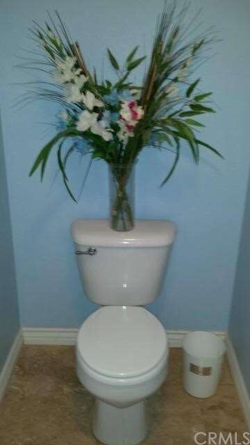 Downstairs guest powder room.