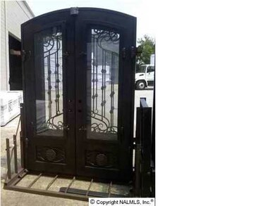 this is the wrought iron front door we are using with the Signature Series in Walnut Cove at Lake Forest, This shows a double, If the plan shows a single door it will be a single
