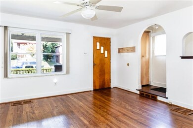 Gorgeous hardwood floors flow throughout the family and dining room.
