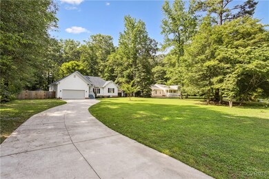 Concrete paved driveway was added by the homeowner