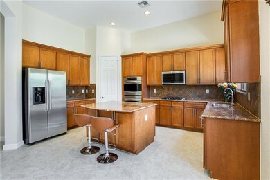 Huge kitchen with gas stove top and walk in pantry