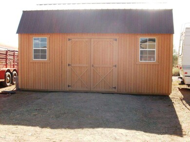 Storage Shed with Work Bench