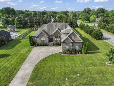 Welcome to 523 Urlacher Dr.  Large lot with mature trees and fenced backyard