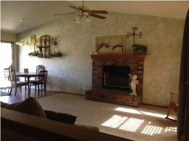 Wood burning fireplace and vaulted ceilings