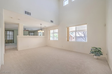 Living room with new carpet showcases a large spac