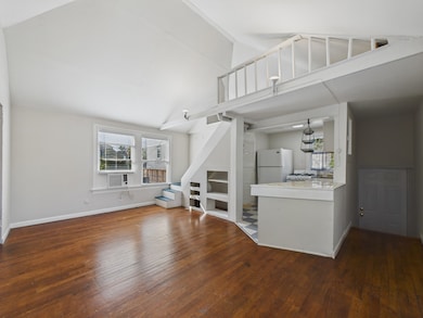 Vaulted Ceiling & Original Hardwood Flooring