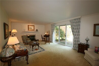 Spacious Living Room with Fireplace and a Sliding 