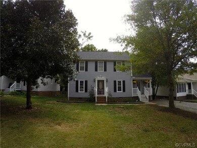 Front view of home with a nice yard.