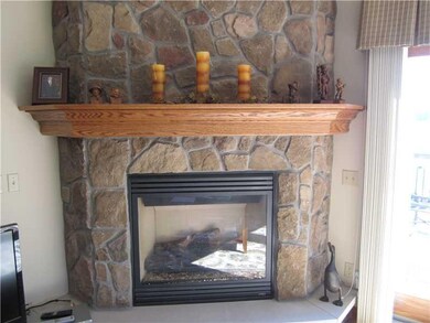 Living Room. Arrange furniture around this gas fir