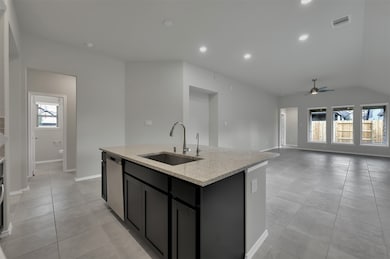 Seamless flow between kitchen, dining, and living