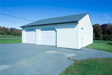 2+ detached garage with storage above