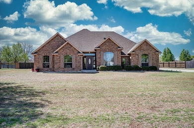 Single story home featuring a front yard, fence, a