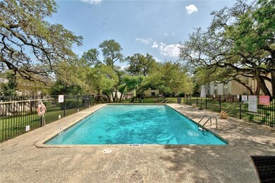 Community pool with a patio area